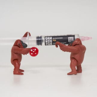 Orangutan Trading Co spore syringe with three toy orangutans playing with it, white background